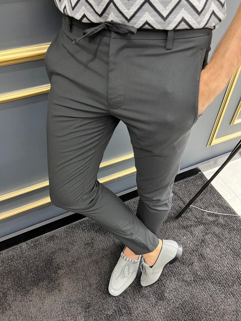https://menstylewith.com/cdn/shop/products/black-rope-detailed-fabric-trousers-540196_1800x1800.jpg?v=1699764823